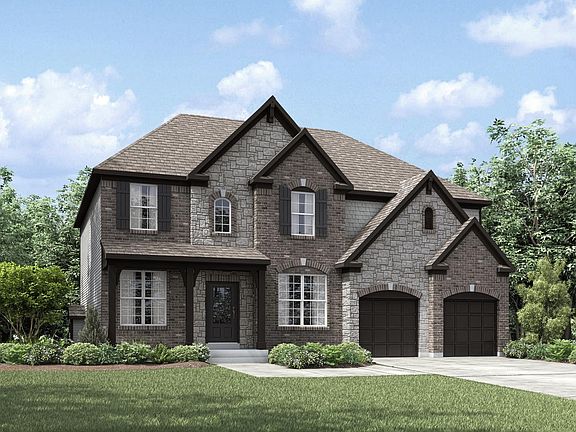 new home with brick and stone