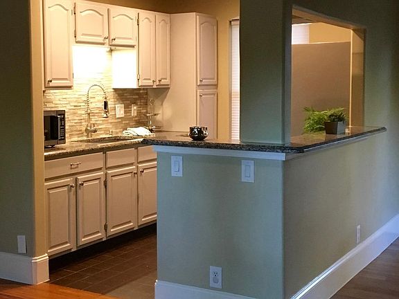 Remodeled Kitchen open to living room and dining room