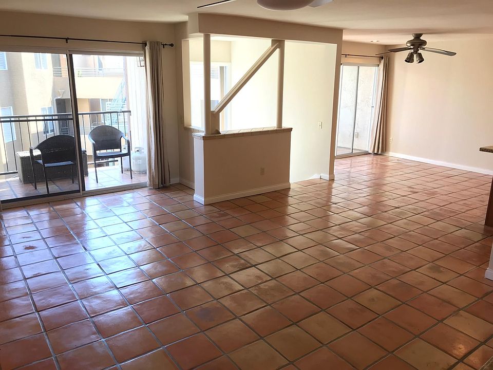 Main living space and balconies. Can fit dining table for eight in dining area