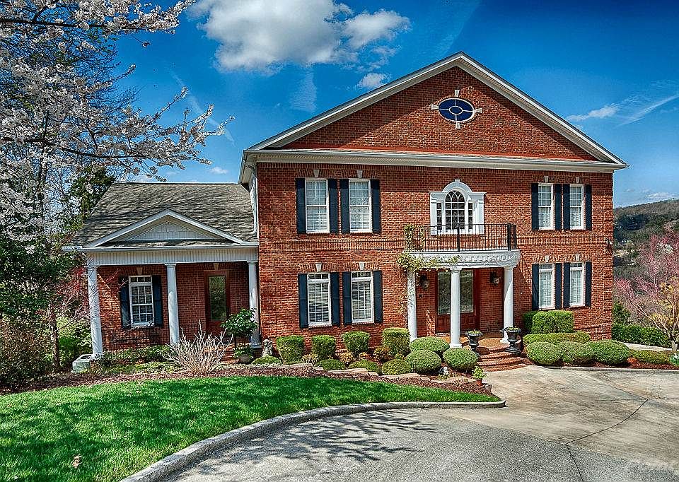 Executive custom built home with a spectacular view in Jones Valley complete with a circular drive and a three car garage. 