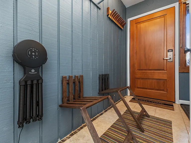 Entryway with Boot Dryer & Fold Out Chairs