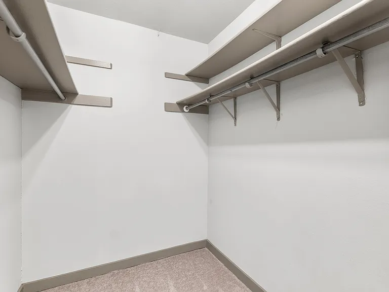 Walk in closet in master/ 1 of 2 total closets in master