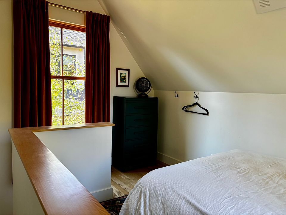 Upstairs bedroom looking toward stairs.