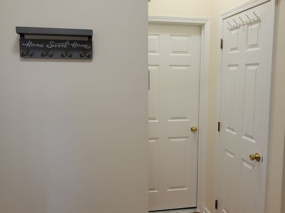 Main Door Entrance, Powder Room and Coat Closet