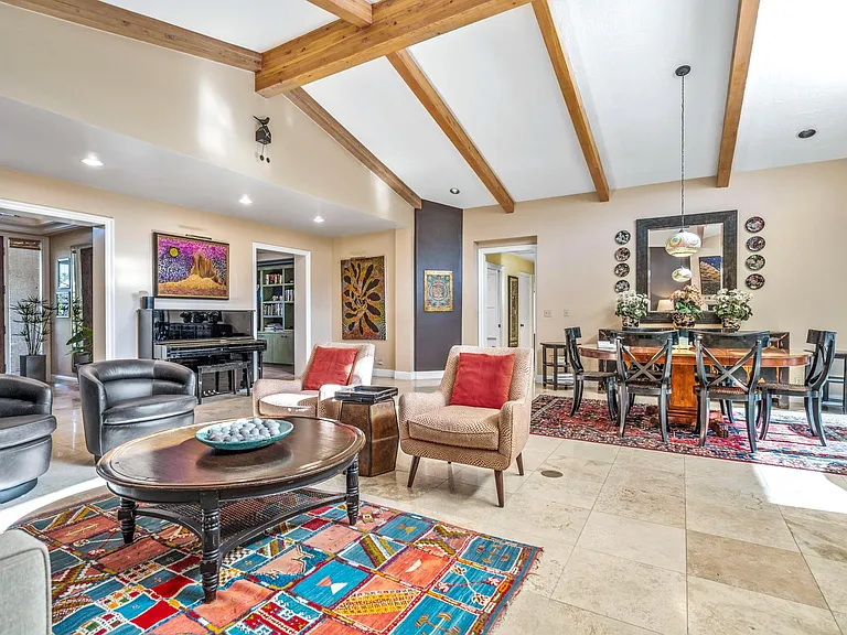 Great room with view to formal dining, kitchen hallway and t.v. den.