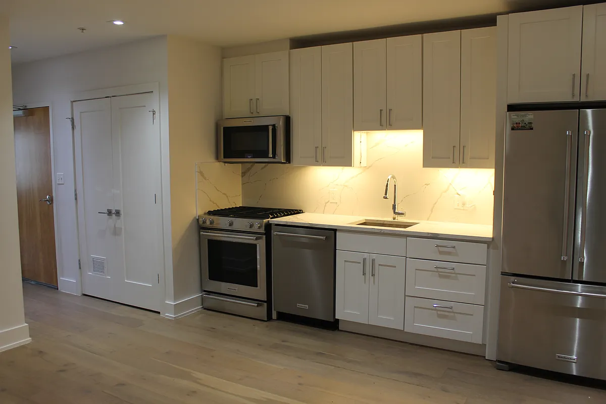 Building Photo - 5110 Fort Totten Dr NE #4
