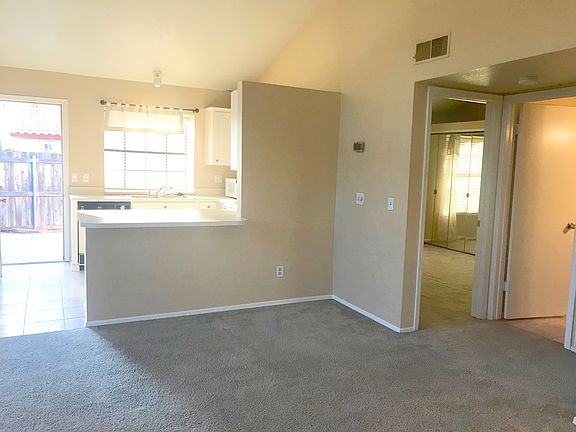 You get a glimpse of the vaulted ceiling here that continues up to the peak.