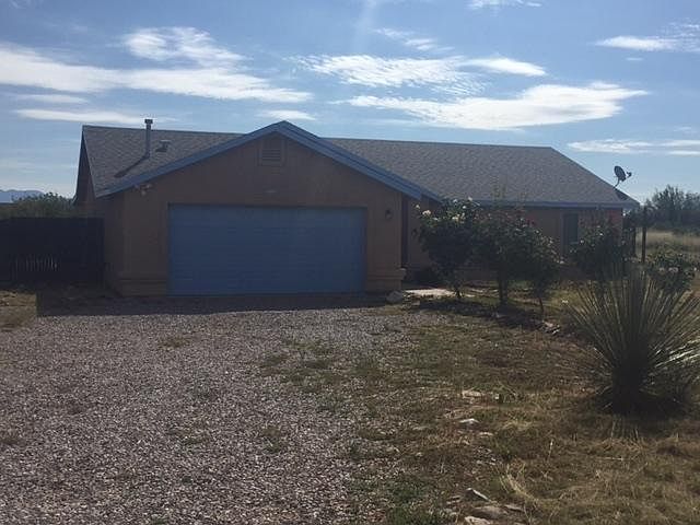 Front of the house looking west