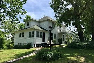 Entry via stairs and deck leading to second floor.