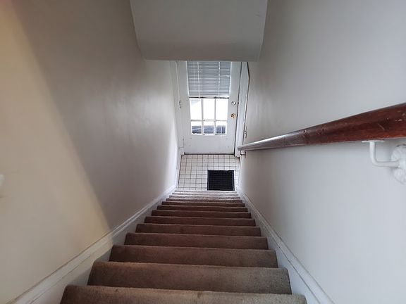 Front entry to apartment , rear entry
behind the house