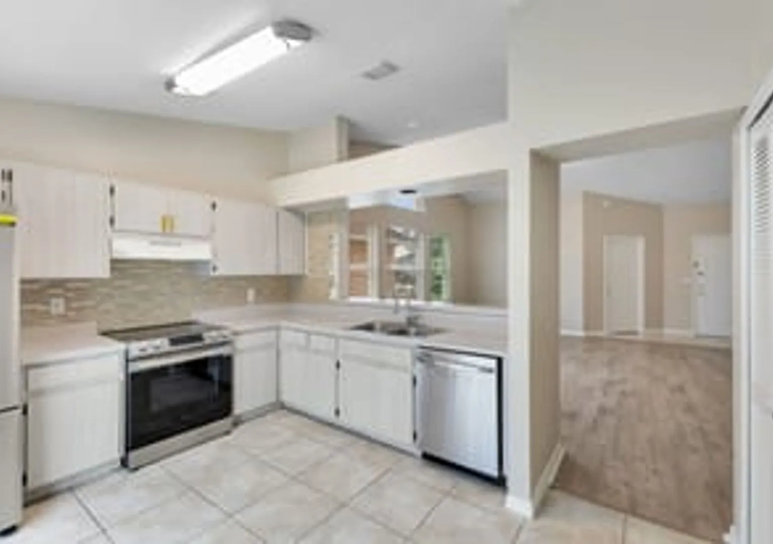 8821 Parliament Court, a 3-bedroom, 2-bathroom, pool home — Photo 4