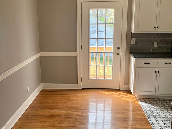 Dining Room view towards backyard porch door.