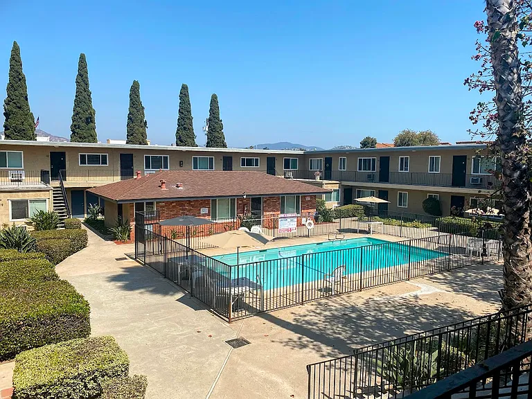 Village Apartments — Photo 6