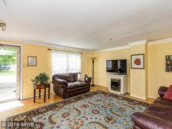 Crown moulding enhances the living room and