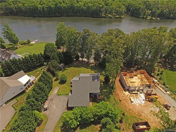 Lake & new home being built