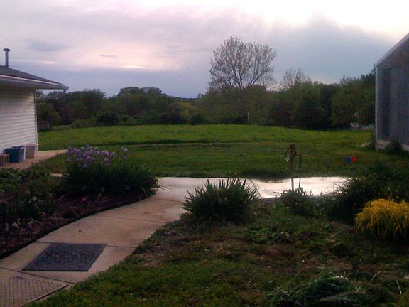View West toward creek between home and barn