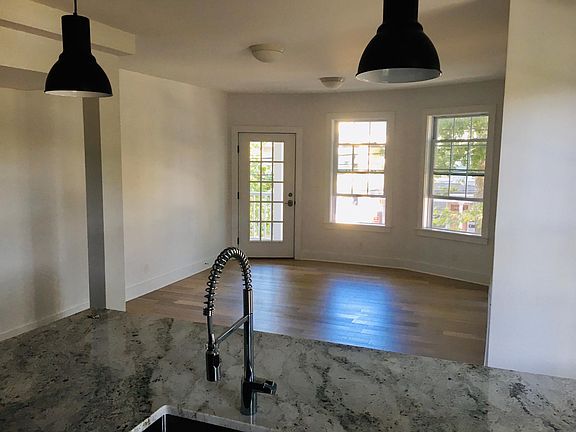 Open concept - door leading to front balcony