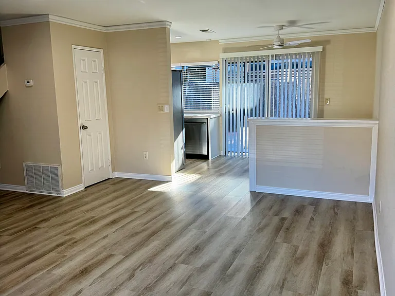 Living room and dining area walks out to private patio
