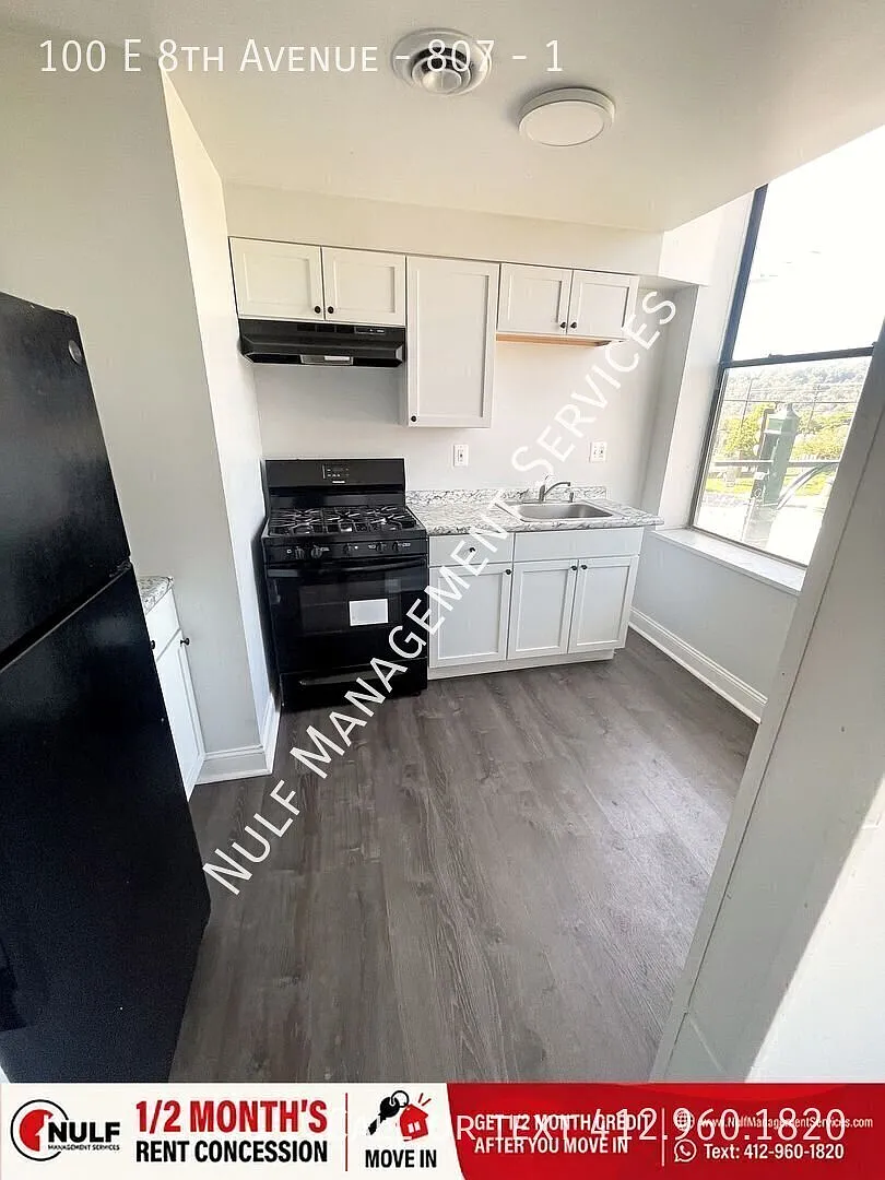 100 E 8th Ave — Photo 1