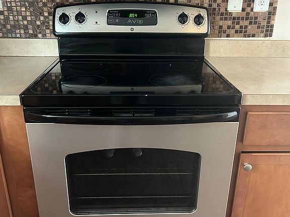 close up of range with electric stove top