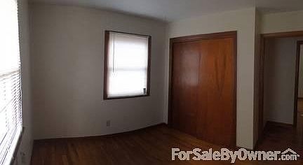 Family Room : Large family room with wood burning fireplace.