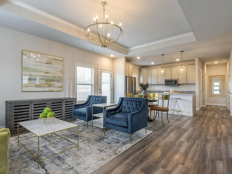 The Torrance- Great Room Living Area is Located at the Front of The Villa and Opens to Kitchen and Dining.