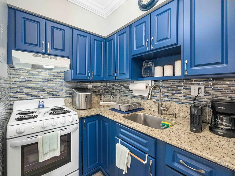 Fully stocked kitchen with everything needed to cook, bake and/or make drinks. Dishes, appliances, ice maker, coffee machines, and more!