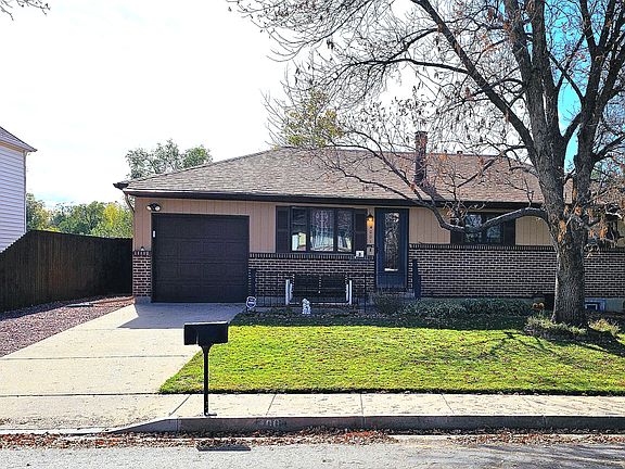 Extra parking on gravel beside driveway