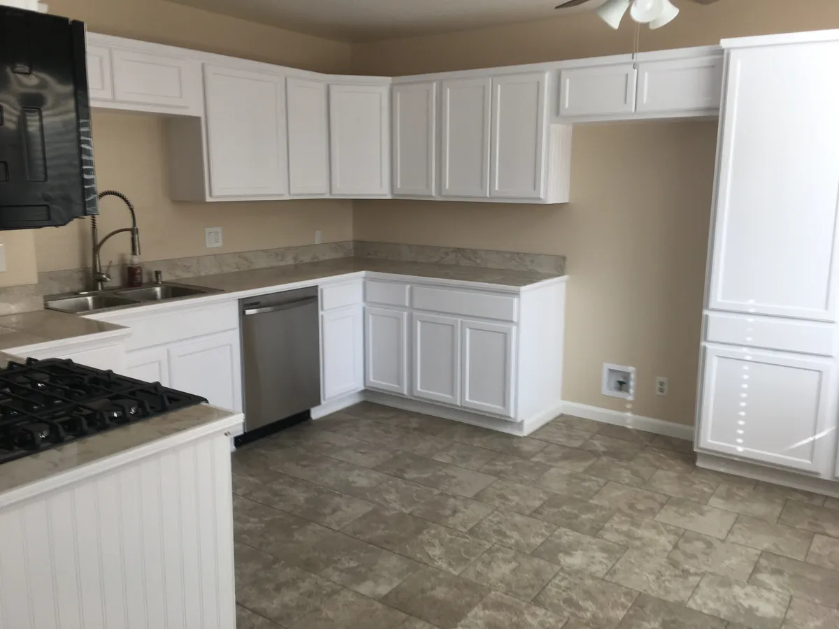 large kitchen with double pantry cabinets - 44710 Fig Ave #44710