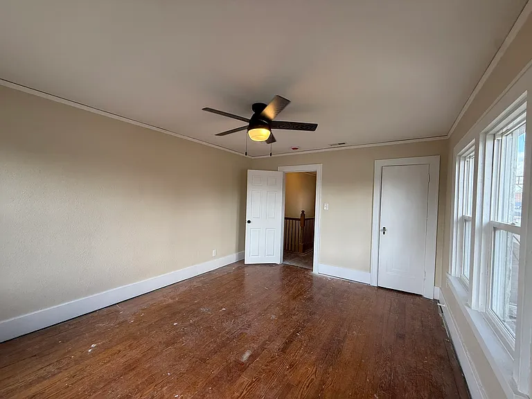 BR2 - upstairs. Hardwood floors are being refinished.