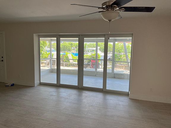 doors to lanai and patio. the doors push completely into the wall giving the option for fresh air