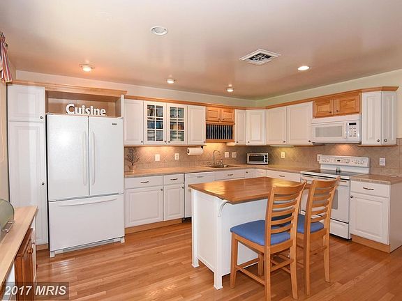 Kitchen has Wood Floors, & Center Island