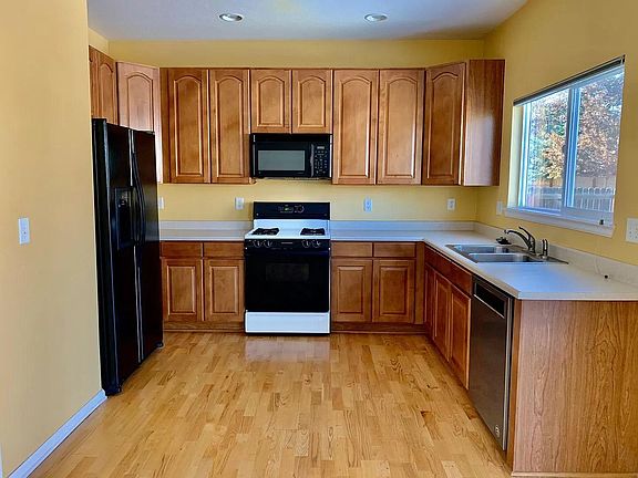 Creating in this kitchen with ample countertop space, maple suede cabinets will be a joy.