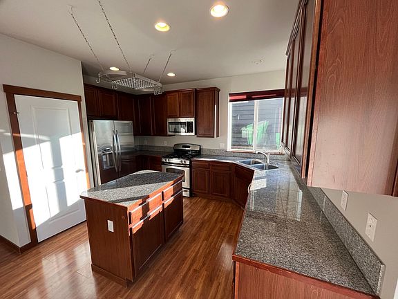 kitchen view of appliances and pantry