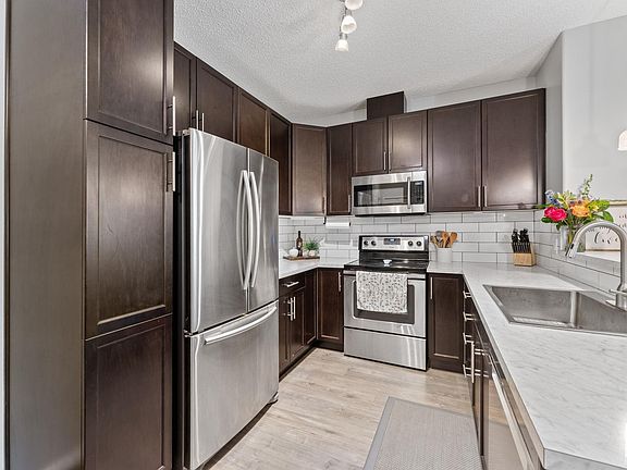 2nd image of 7825 71st St NW #244