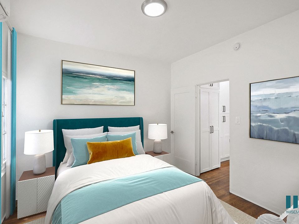 Bedroom with Hardwood Floors and Large-Size Windows