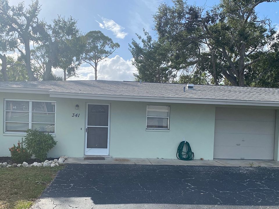 FRONT ENTRANCE WITH SINGLE CAR GARAGE ATTACHED