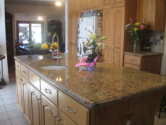 Kitchen View To Dining & Family Rooms