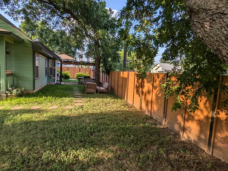 Side yard with nice shaded trees