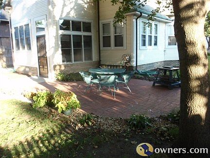 Kitchen & TV Room windows overlook patio