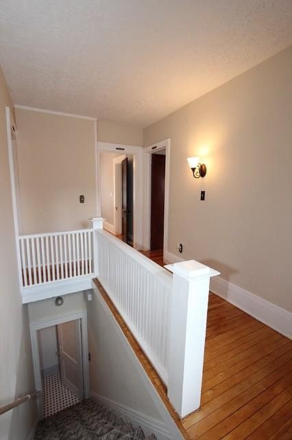Staircase up into second floor unit