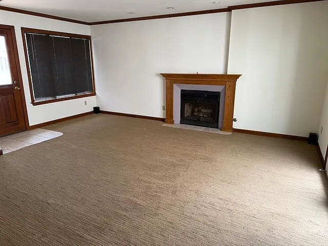 Living room with gas fireplace.
