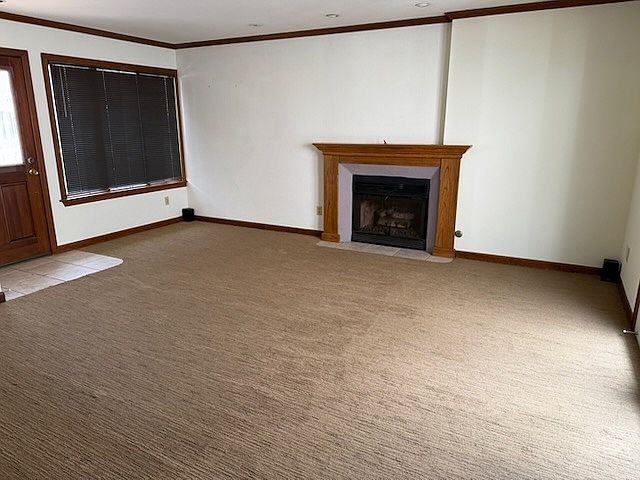 Living room with gas fireplace.
