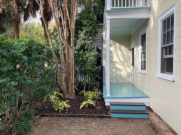 Garden, front porch and entry door