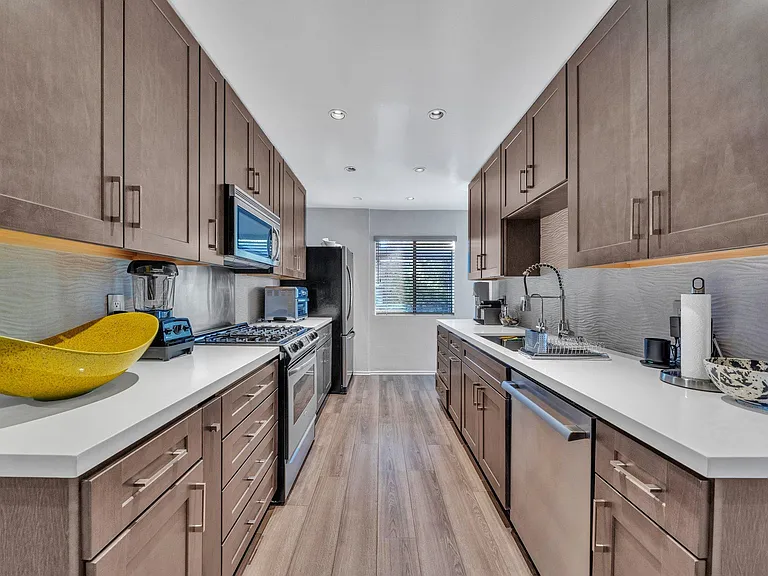 Kitchen with stainless steel appliances