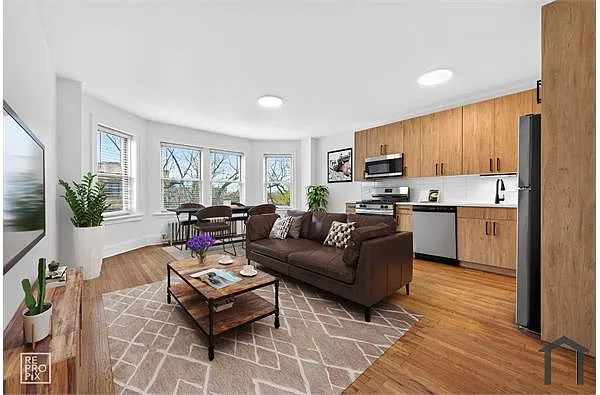 Building Photo - 6308 N Artesian Ave #3