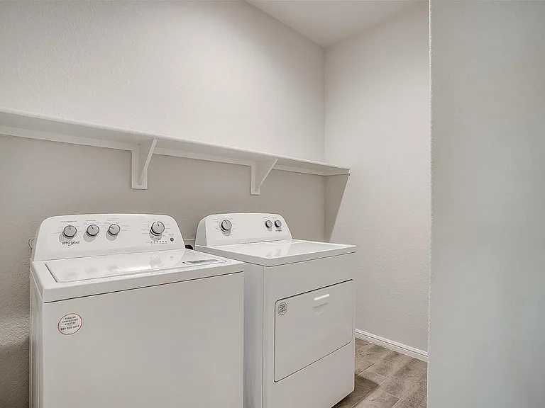 Laundry room with extra space. Washer and Dryer stay!