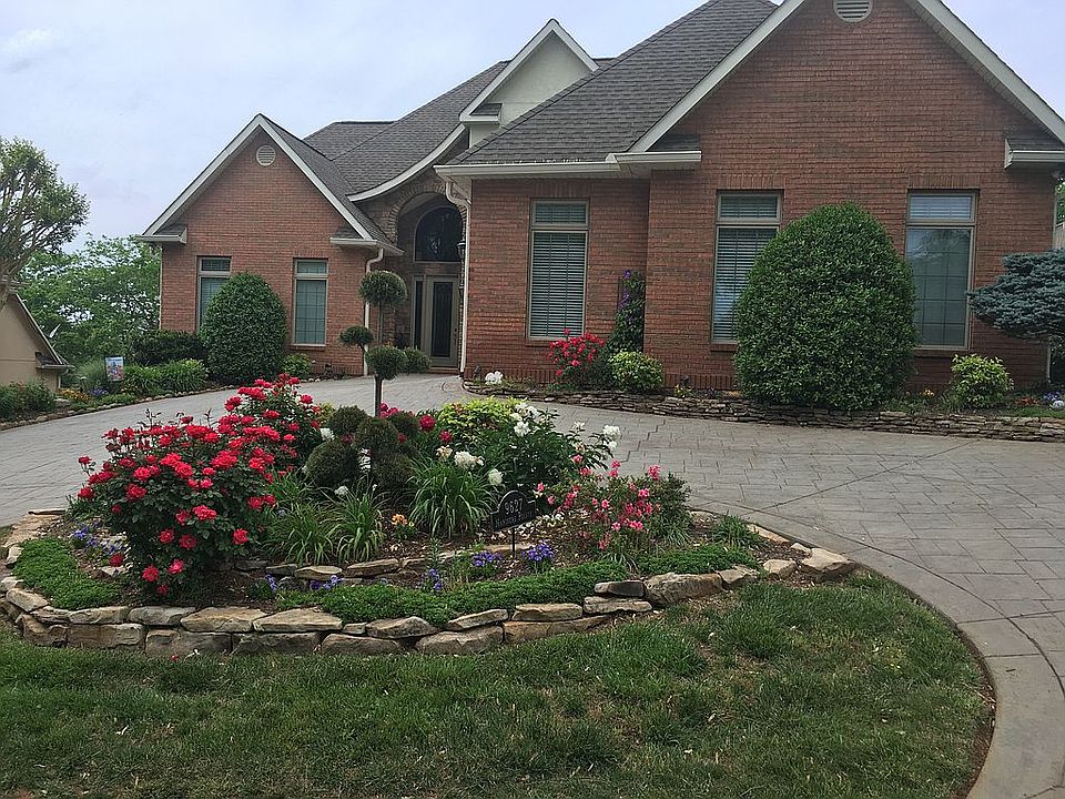 Circle drive and flower bed