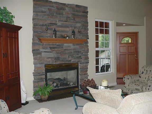 Lovely gas fireplace in the living room adds warmth and beauty.