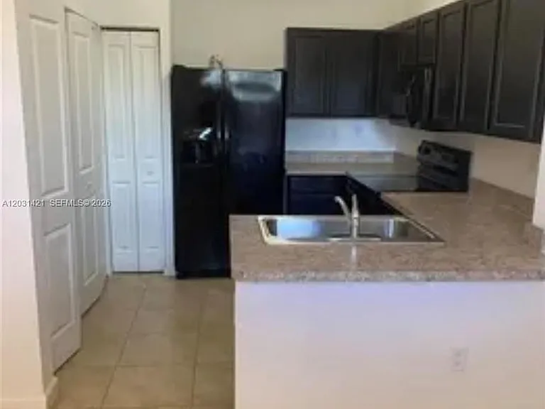 3621 NW 30th Ct — Photo 1